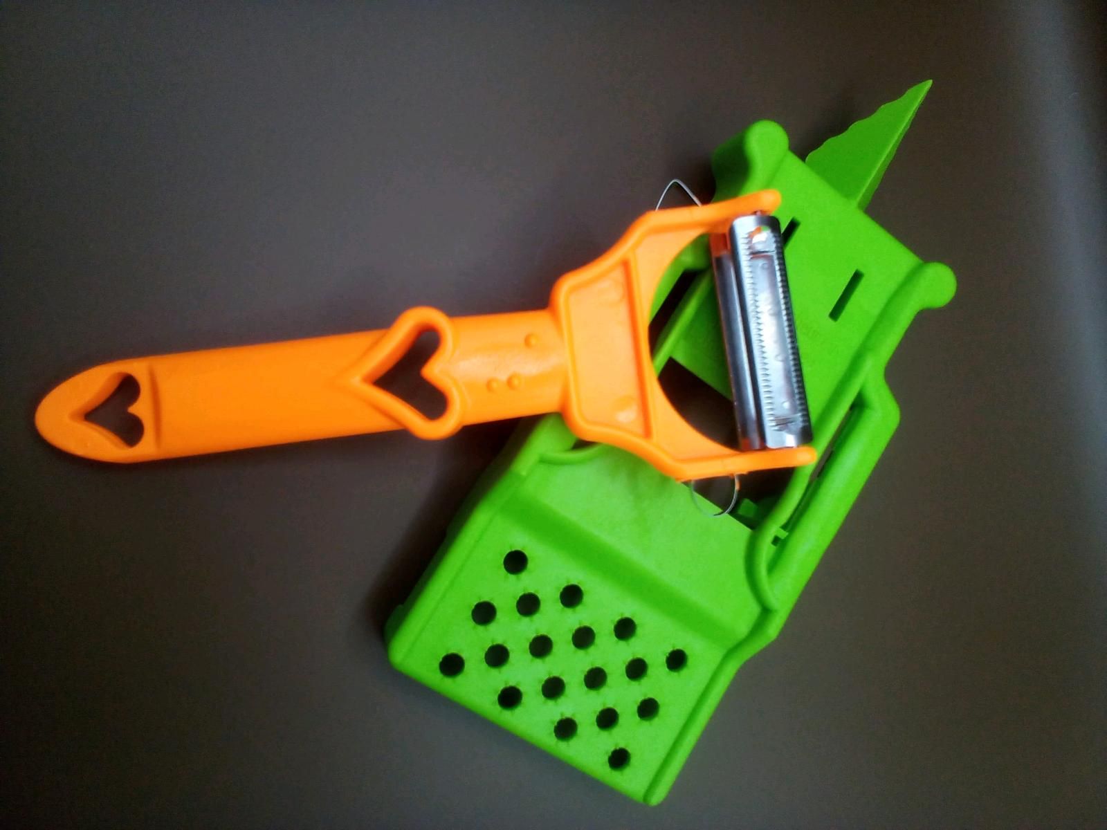 Dual-Purpose Shredder And Vegetable Peeler